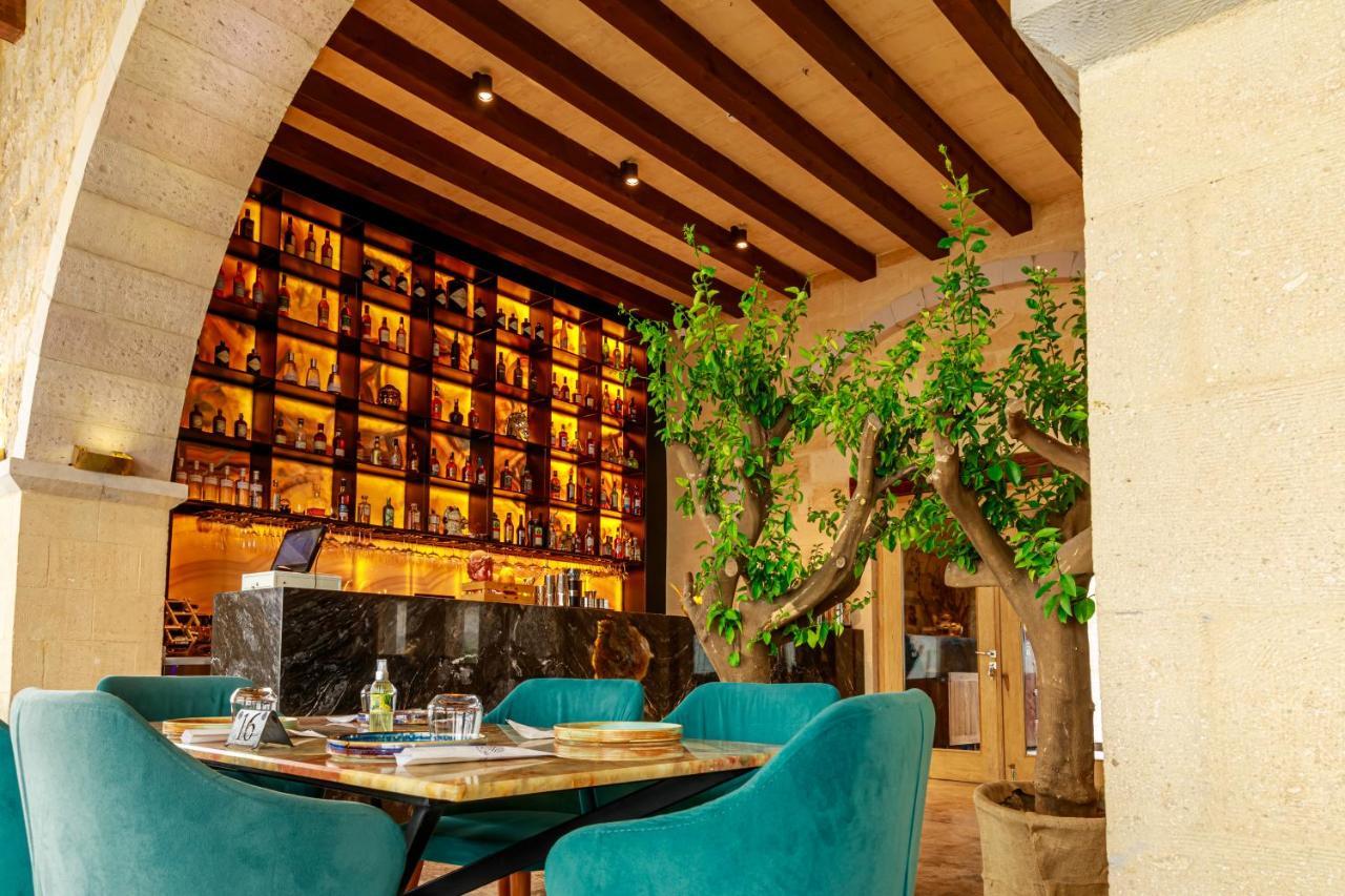 Millstone Cave Suites Hotel Üchisar Bagian luar foto