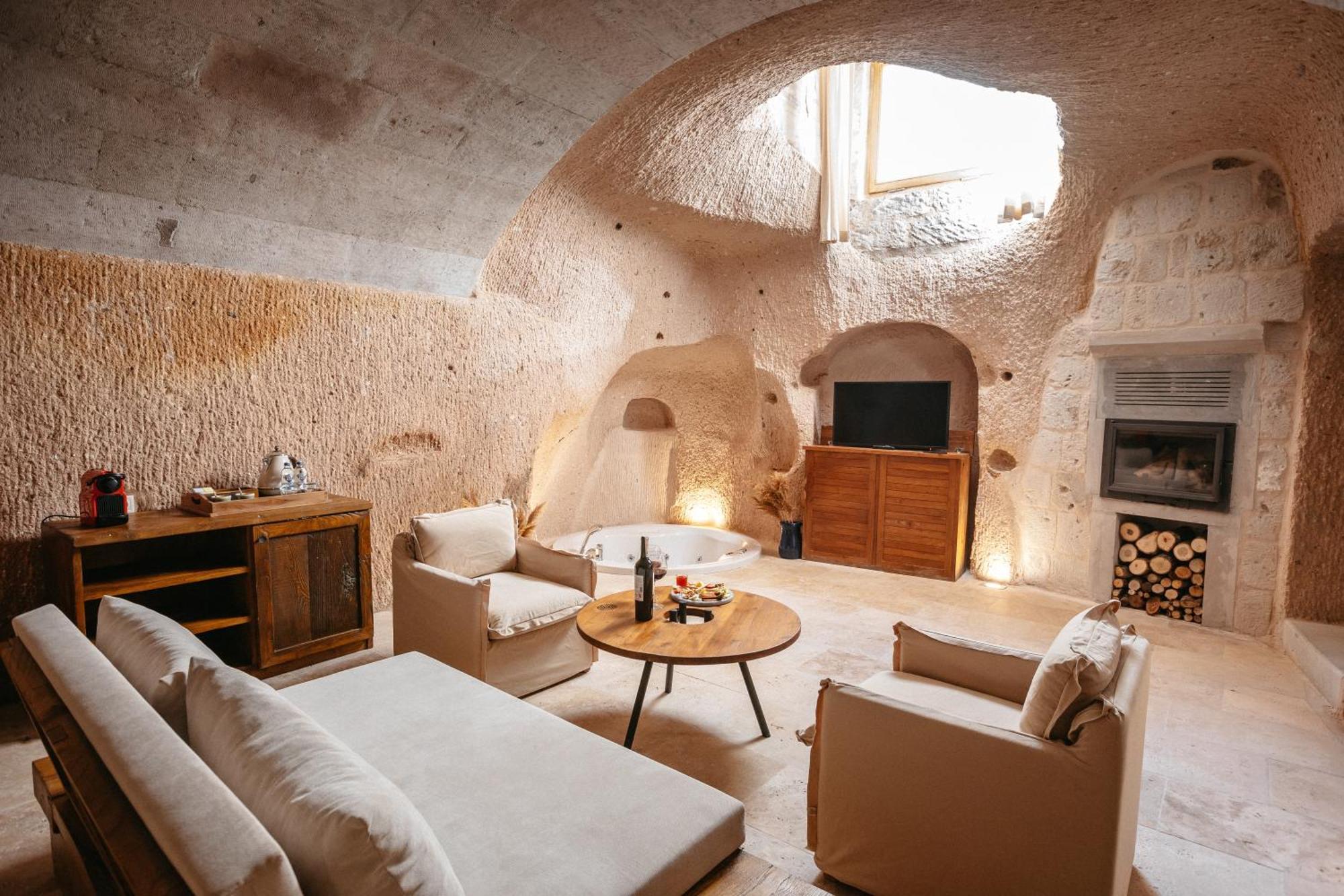 Millstone Cave Suites Hotel Üchisar Bagian luar foto