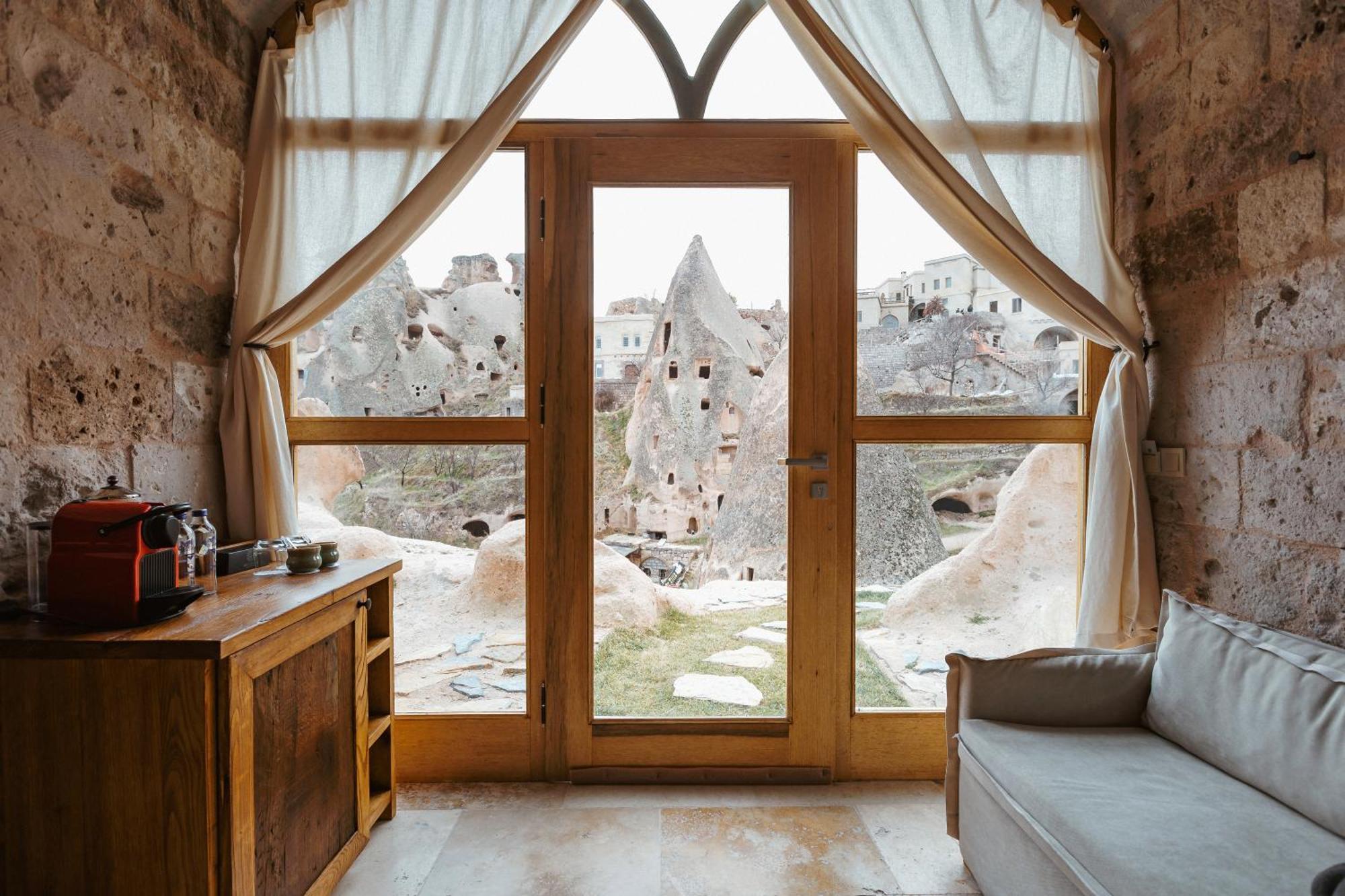 Millstone Cave Suites Hotel Üchisar Bagian luar foto