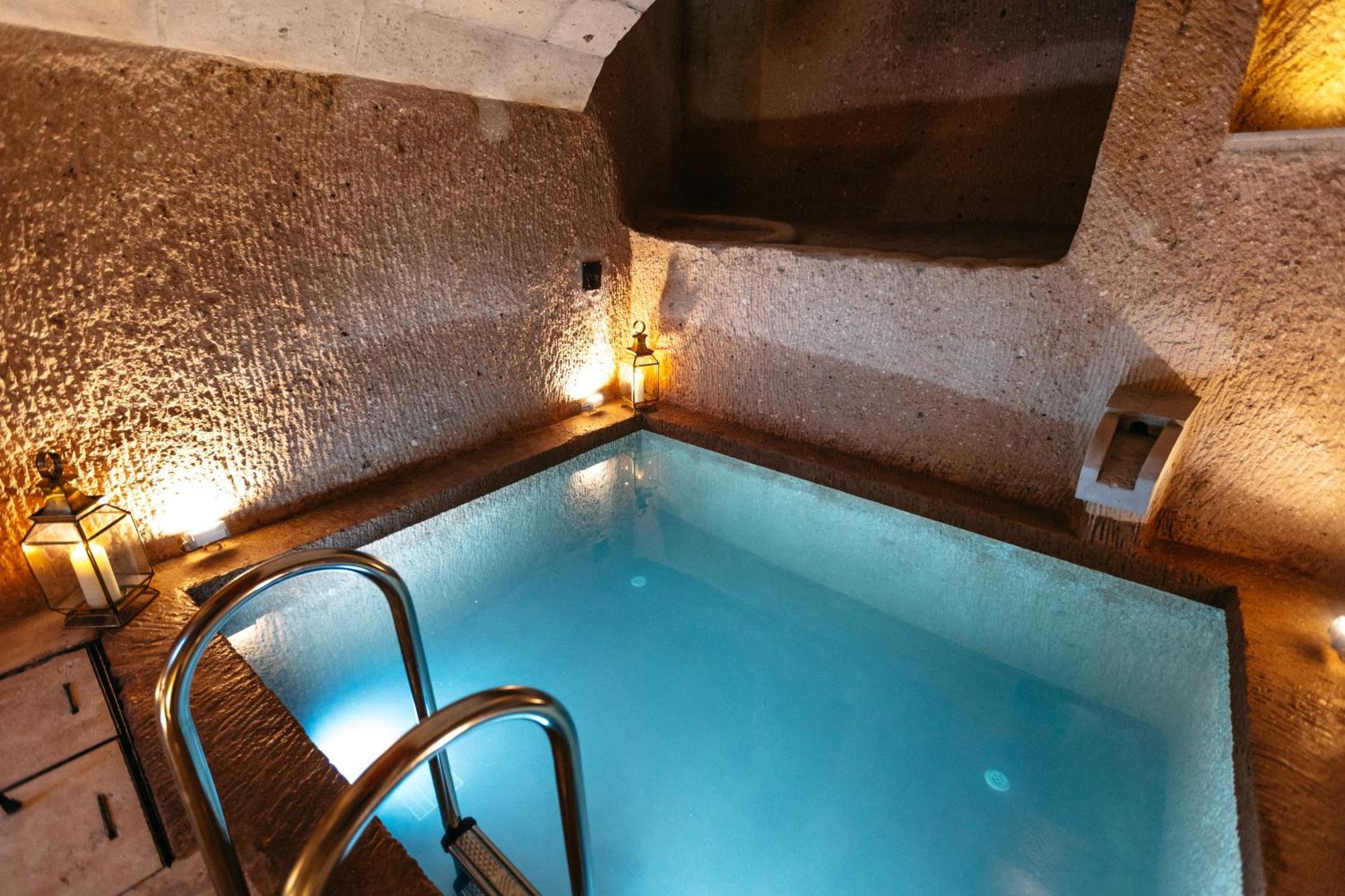 Millstone Cave Suites Hotel Üchisar Bagian luar foto