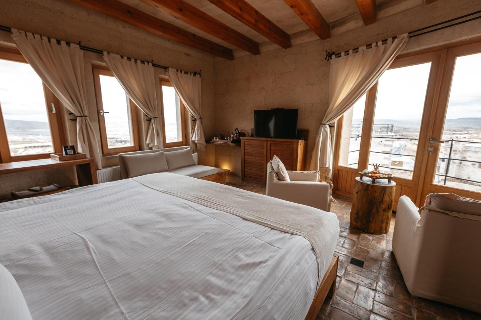 Millstone Cave Suites Hotel Üchisar Bagian luar foto