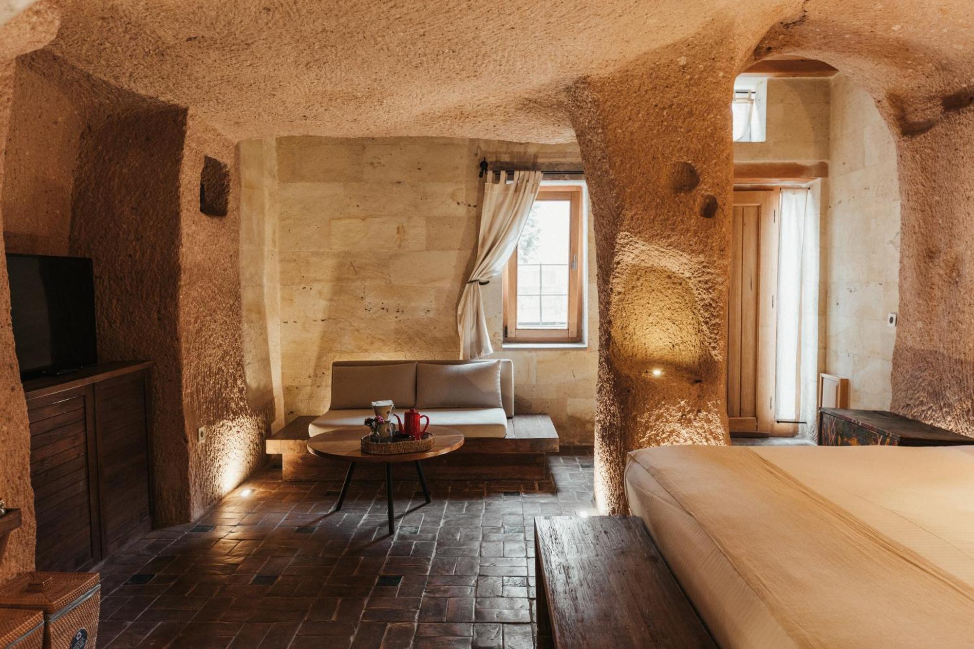 Millstone Cave Suites Hotel Üchisar Bagian luar foto