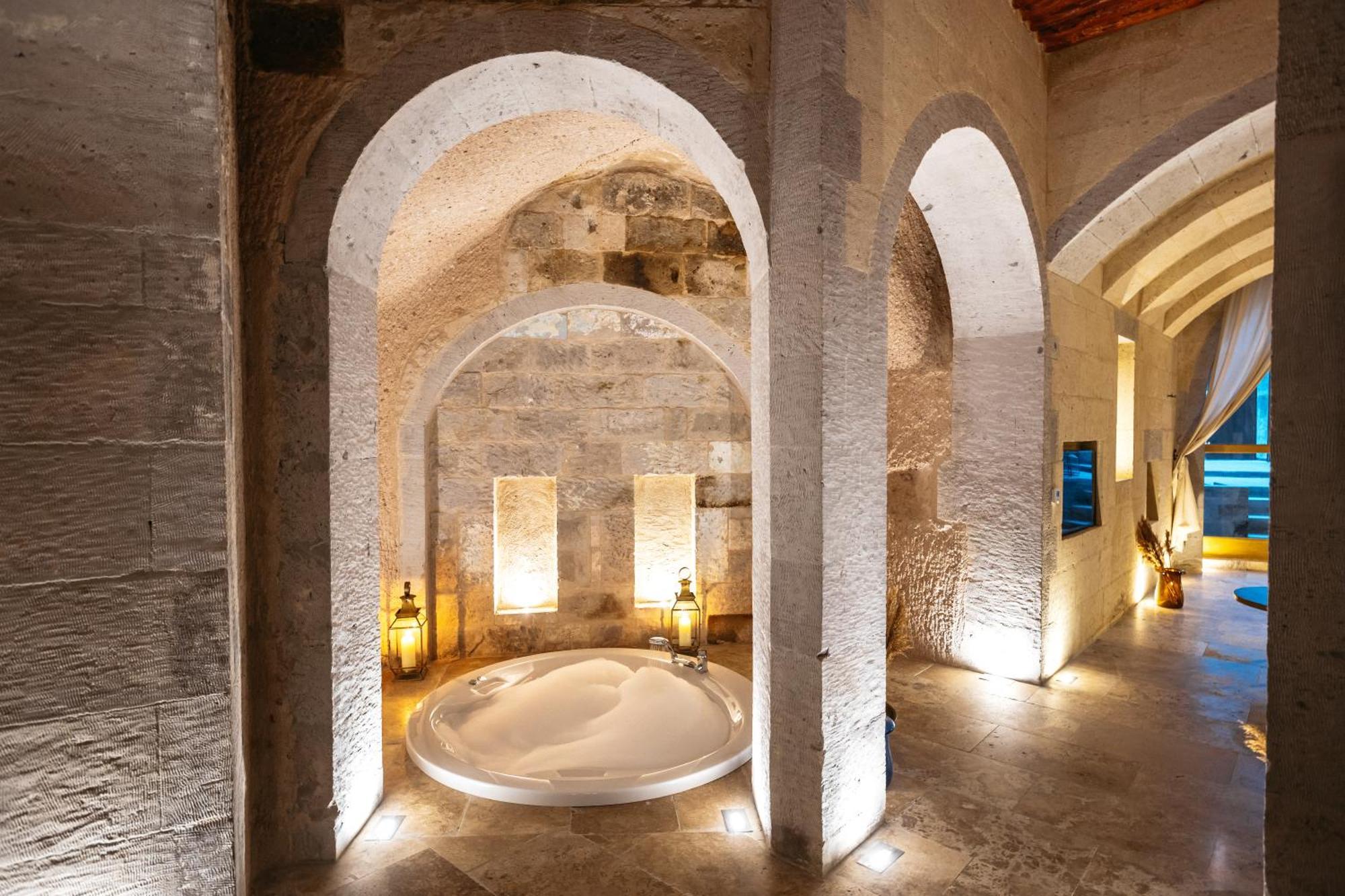 Millstone Cave Suites Hotel Üchisar Bagian luar foto