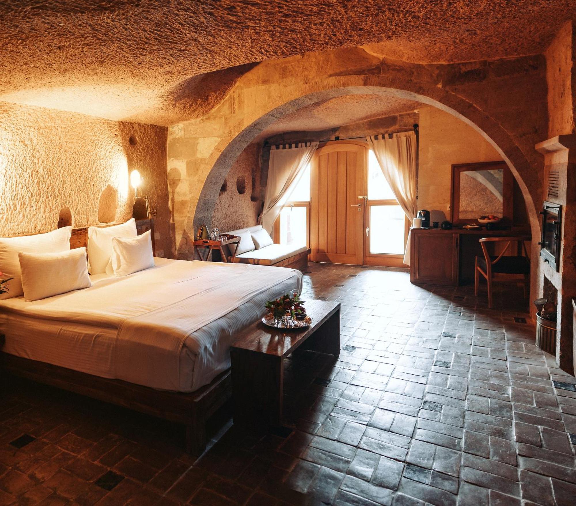 Millstone Cave Suites Hotel Üchisar Bagian luar foto