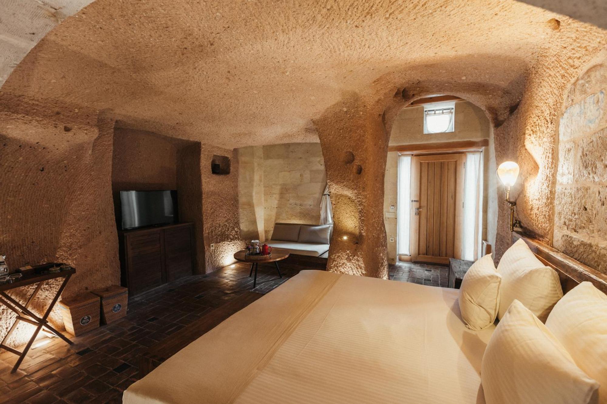 Millstone Cave Suites Hotel Üchisar Bagian luar foto