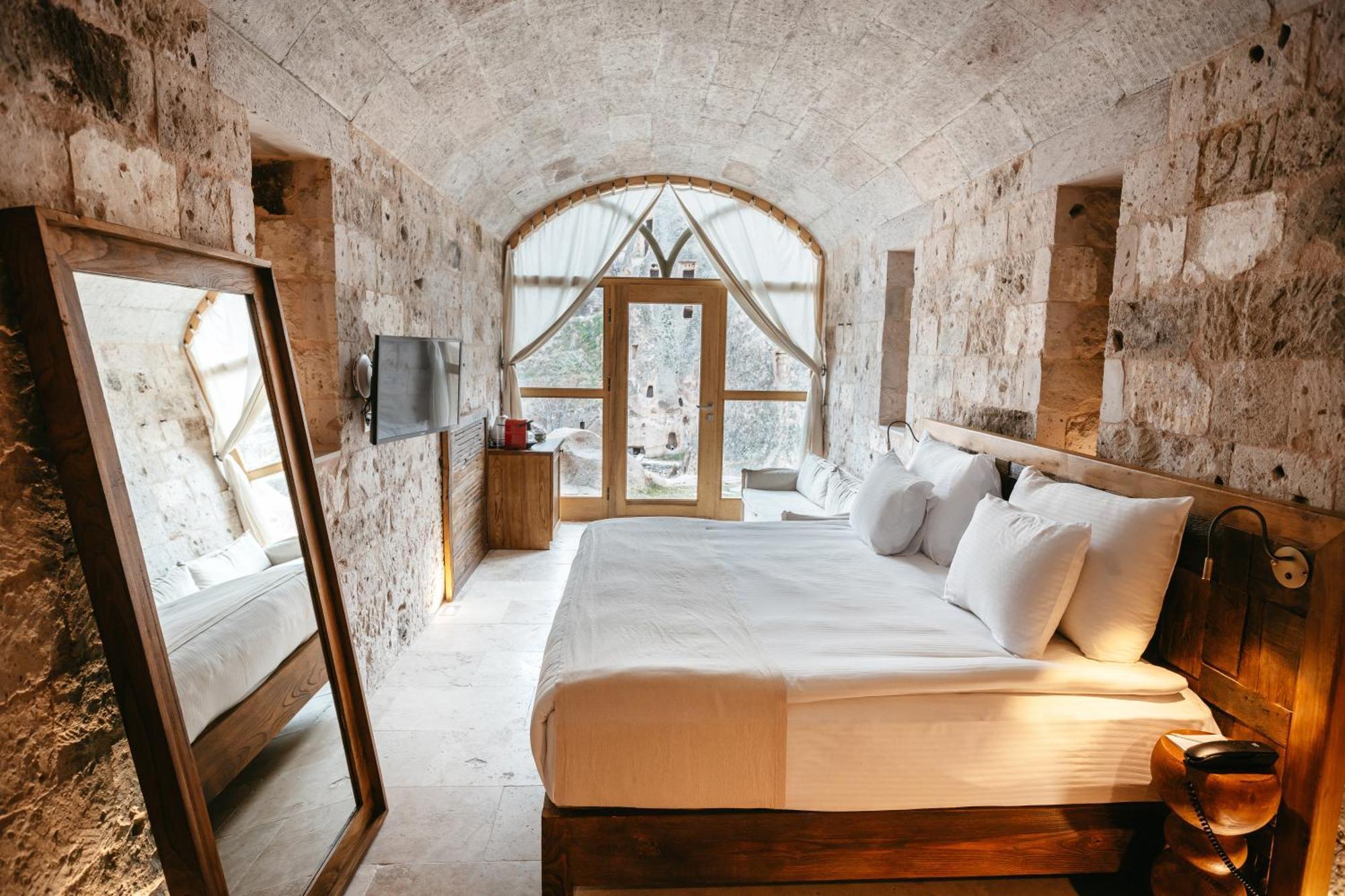 Millstone Cave Suites Hotel Üchisar Bagian luar foto