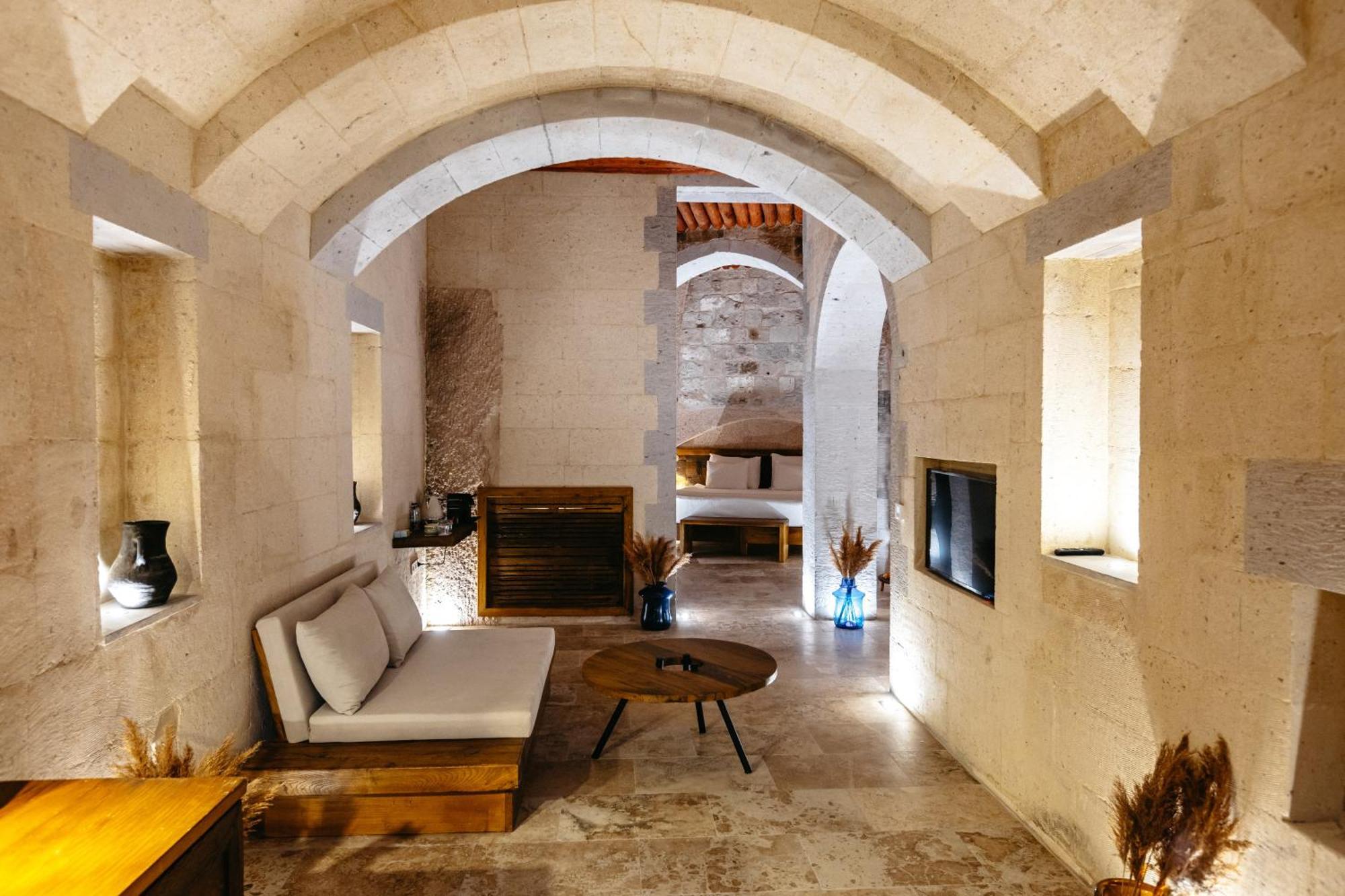 Millstone Cave Suites Hotel Üchisar Bagian luar foto