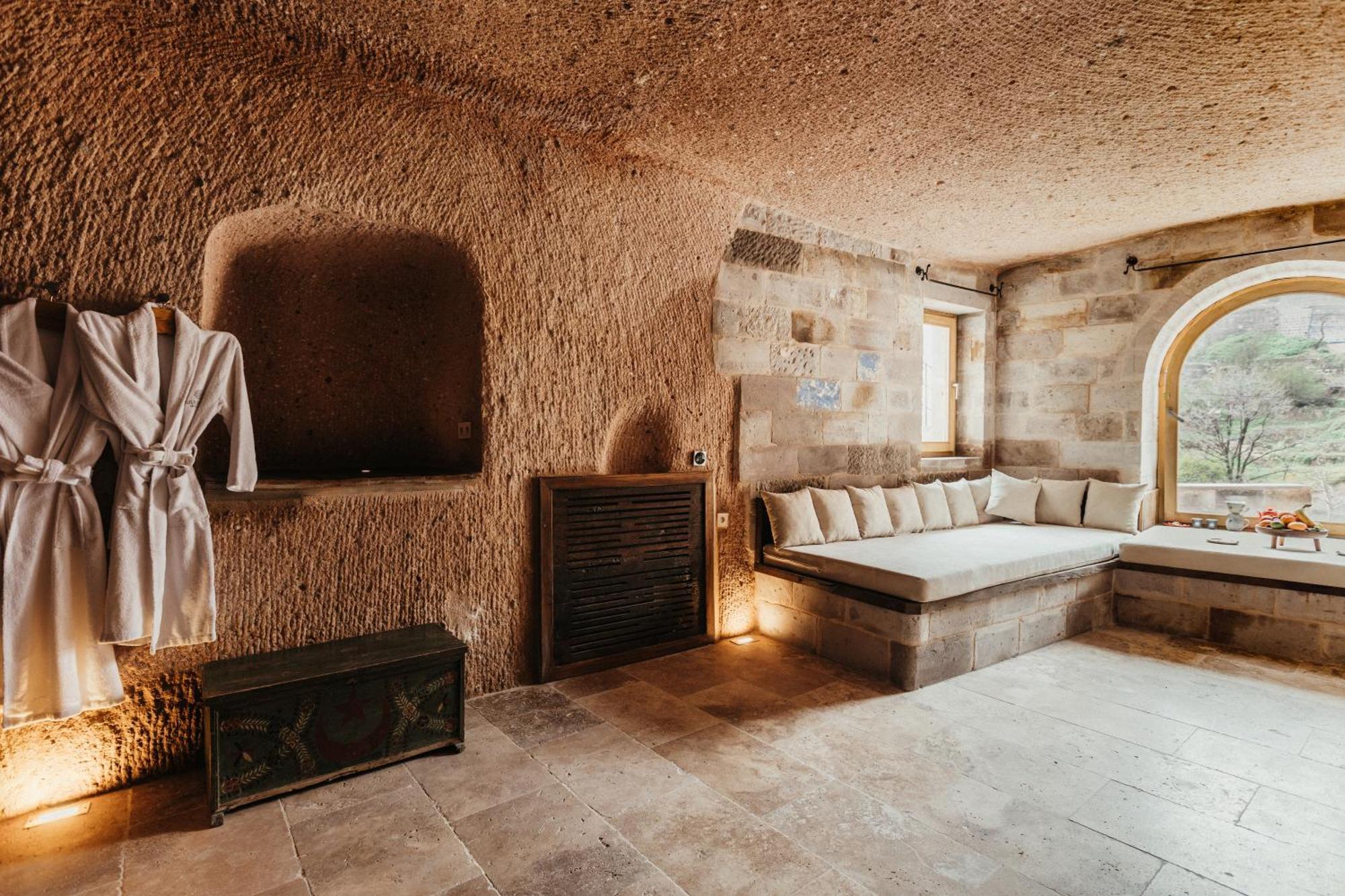 Millstone Cave Suites Hotel Üchisar Bagian luar foto