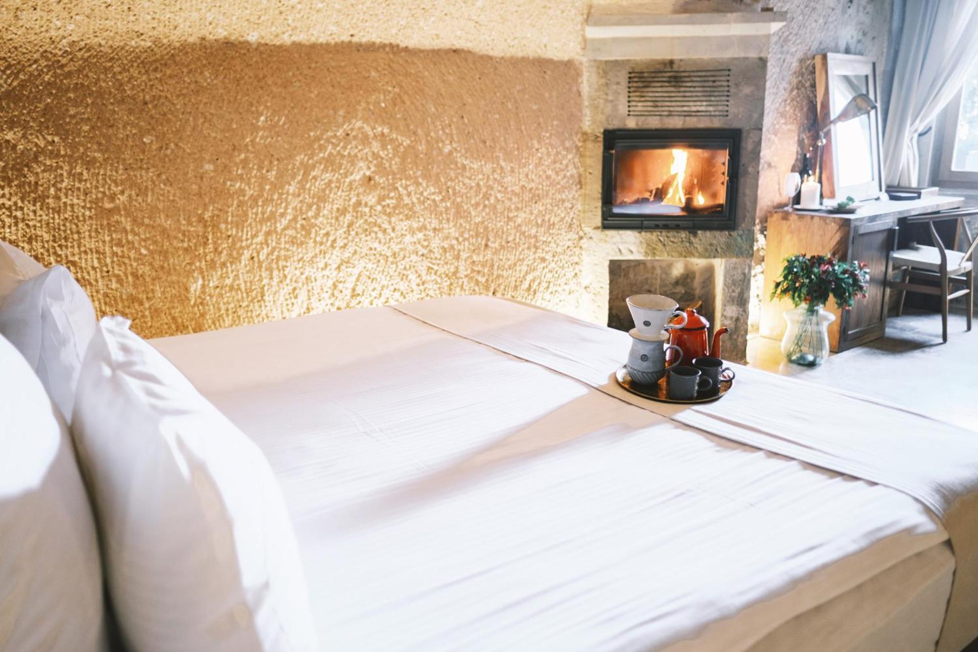 Millstone Cave Suites Hotel Üchisar Bagian luar foto