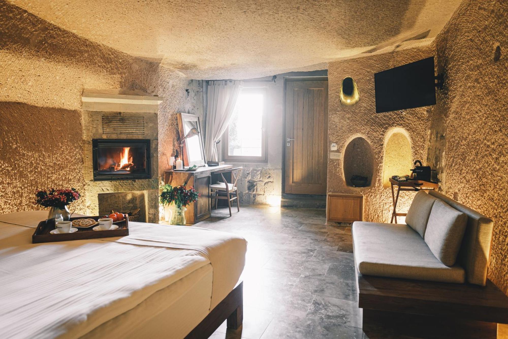 Millstone Cave Suites Hotel Üchisar Bagian luar foto