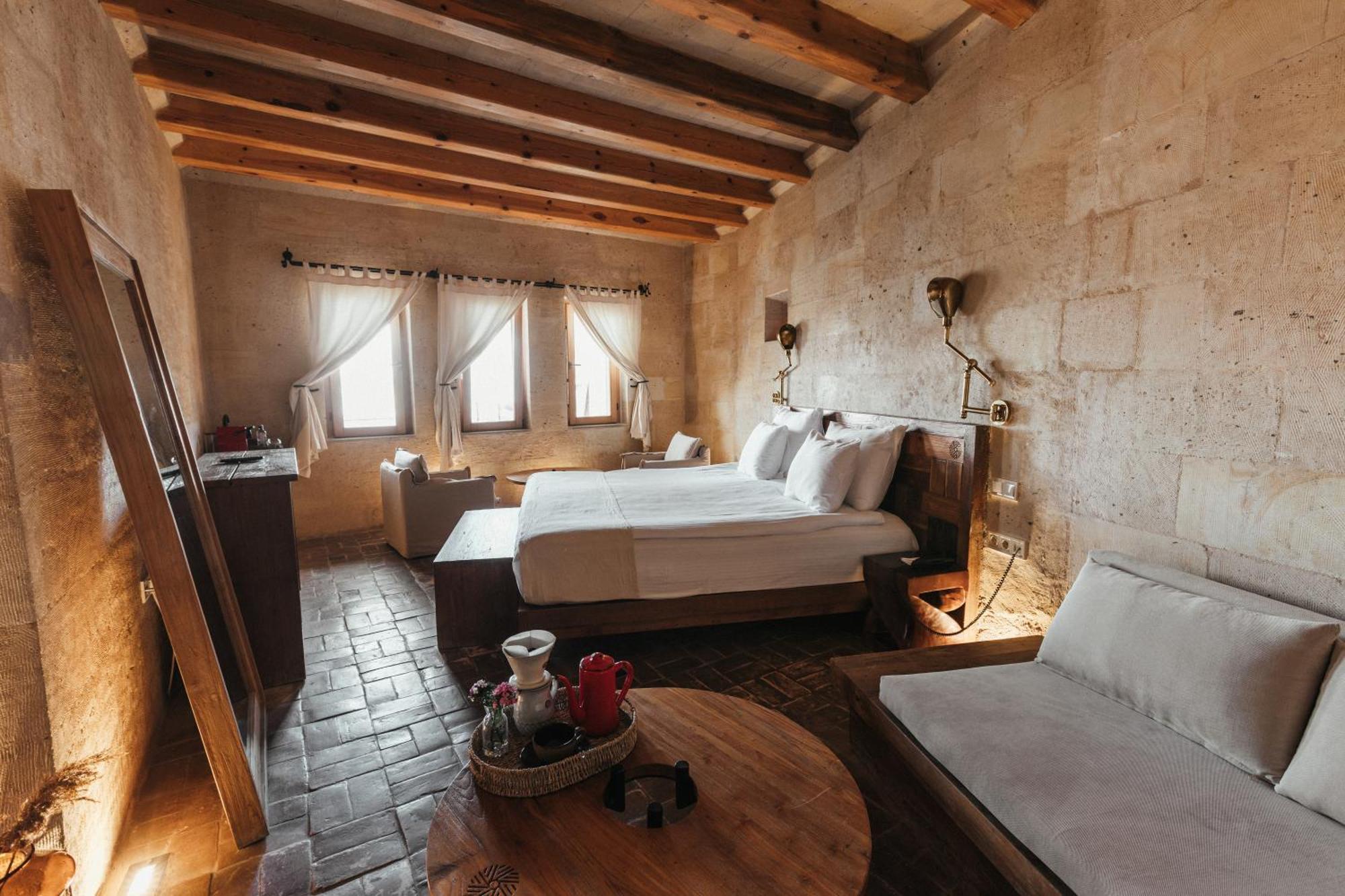Millstone Cave Suites Hotel Üchisar Bagian luar foto