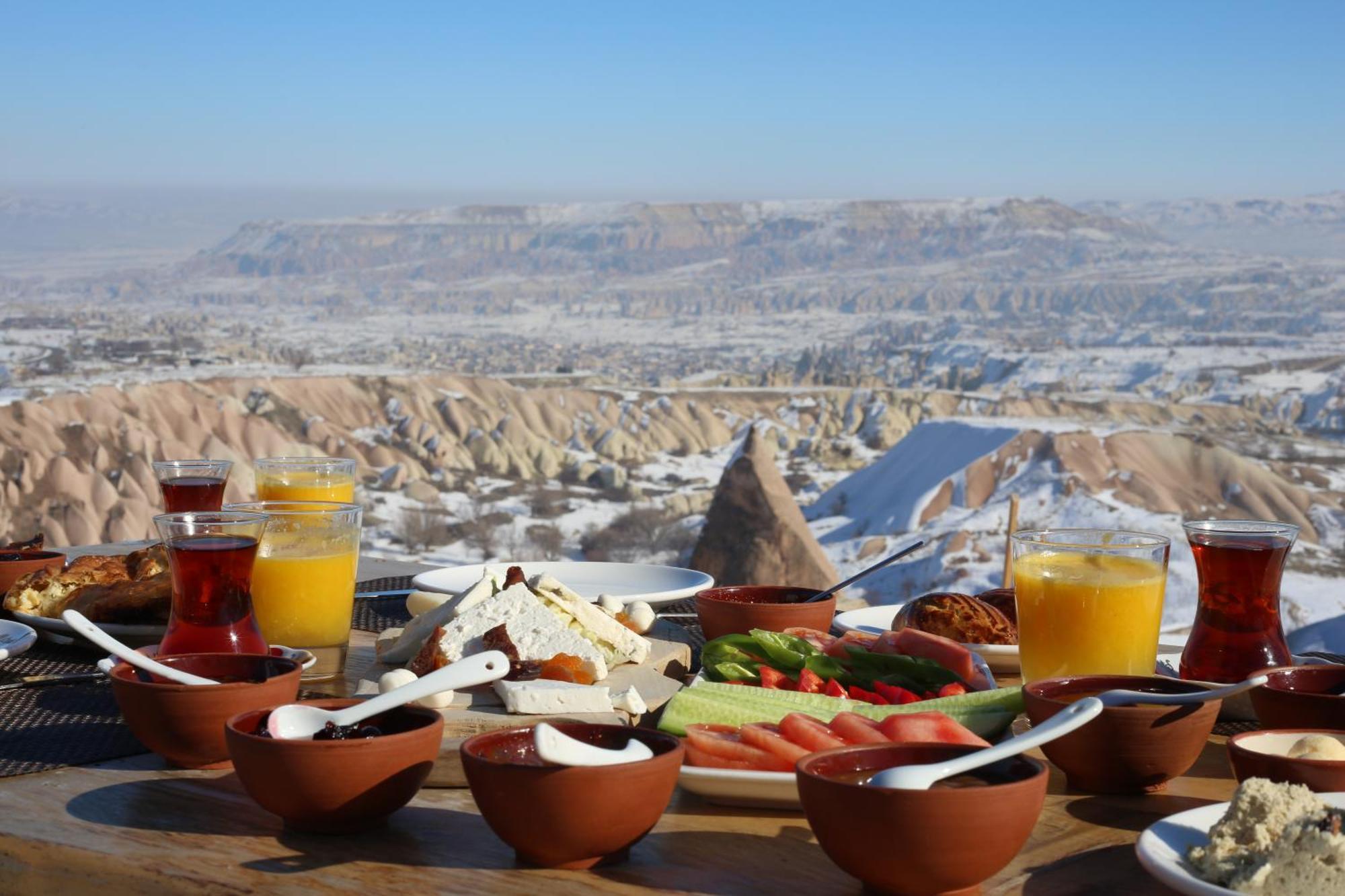 Millstone Cave Suites Hotel Üchisar Bagian luar foto