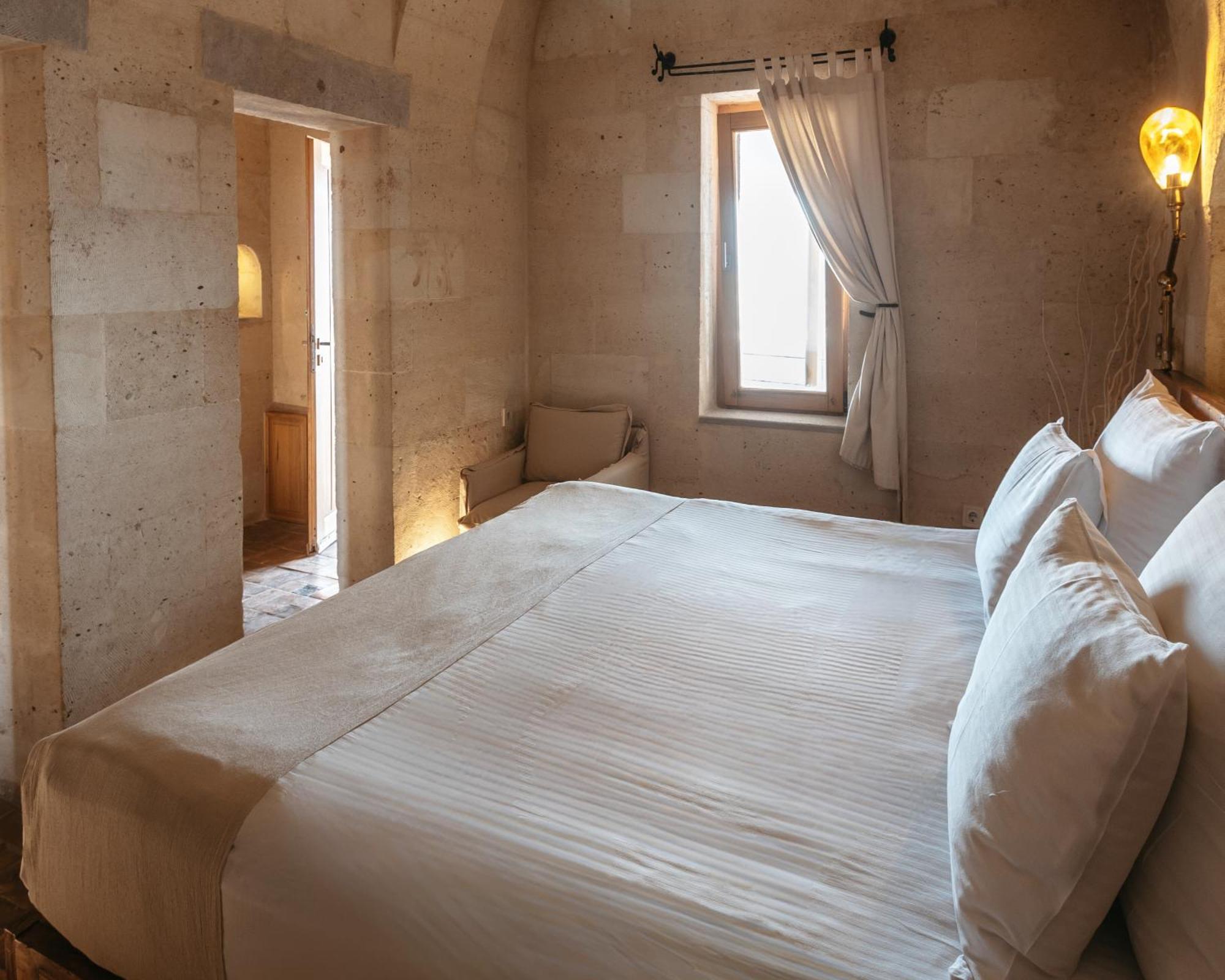 Millstone Cave Suites Hotel Üchisar Bagian luar foto